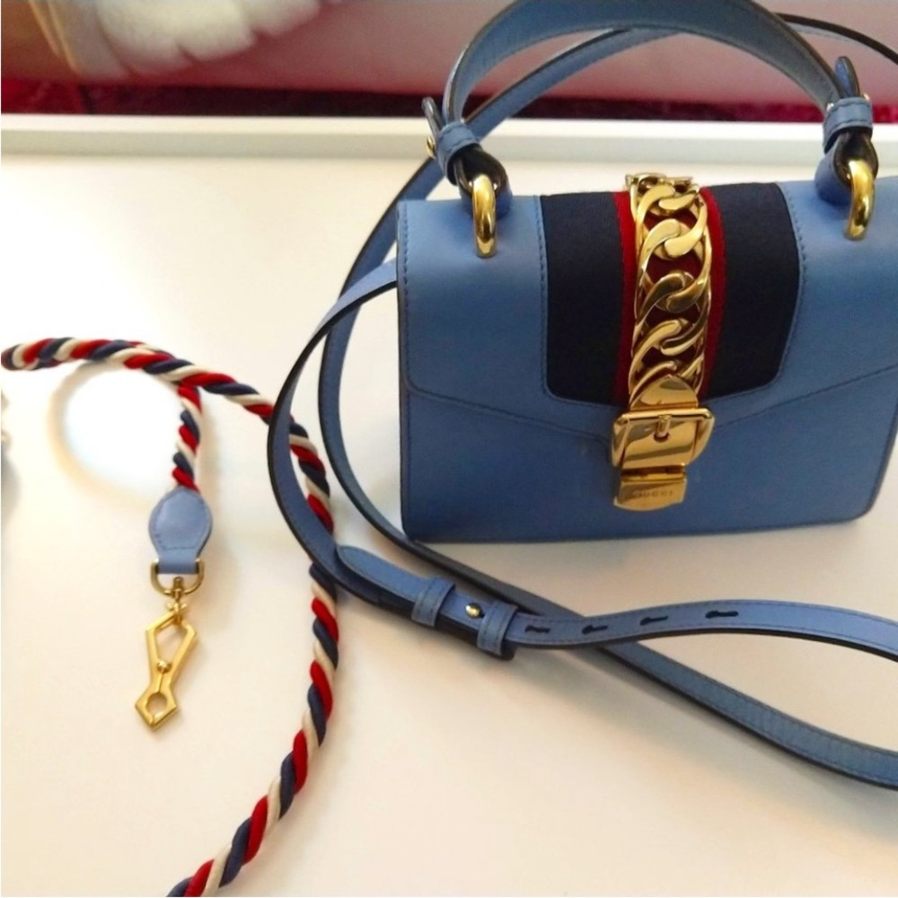 Authentic Gucci Sylvie Mini Bag with Gold Accents
